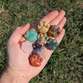 Carved crystal paws in a mix of natural stones from amethyst and rose quartz to labradorite and green aventurine.