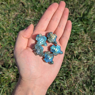 Labradorite carved crystal turtles showing natural flash